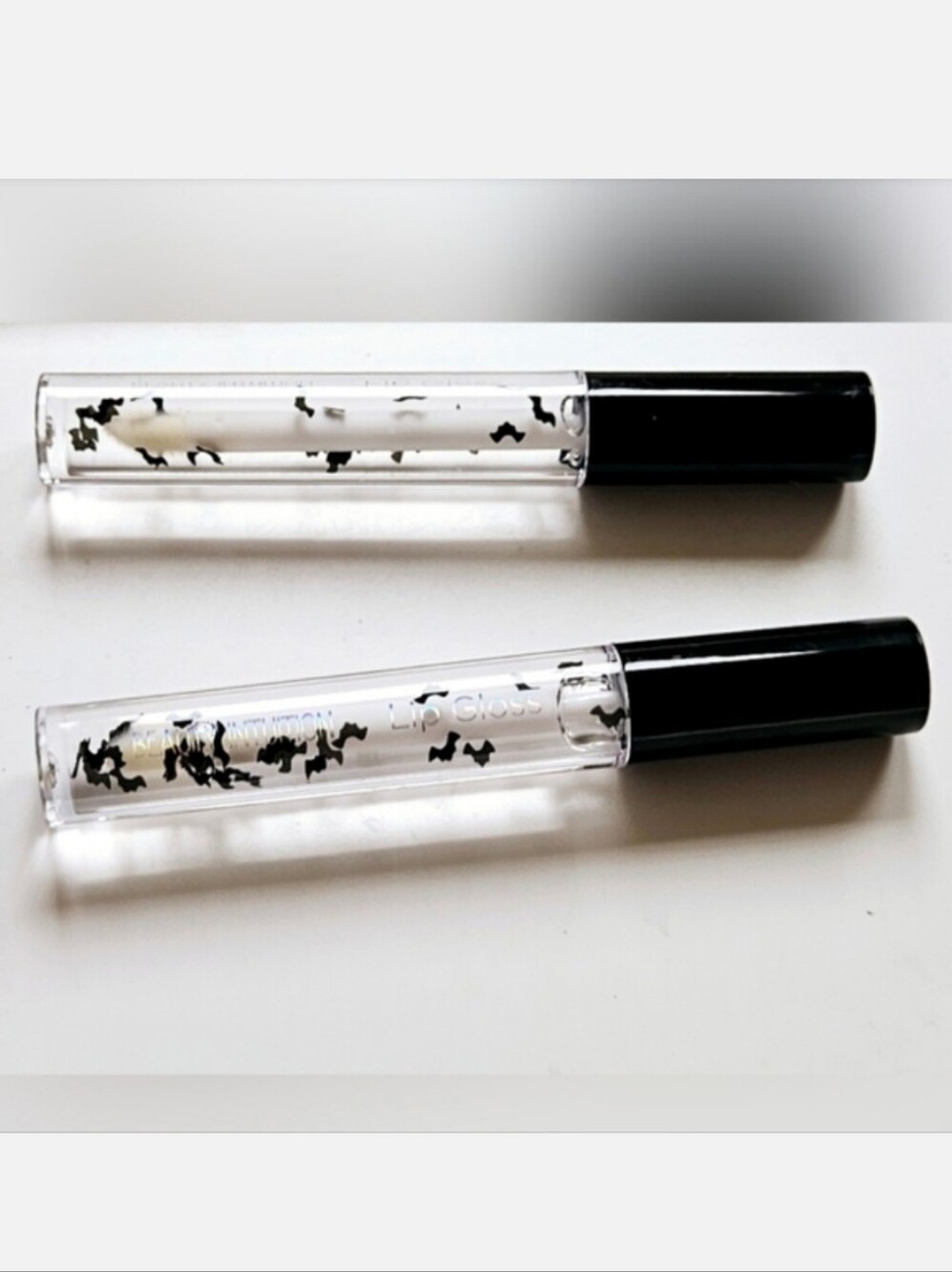 NWT 》2 ×《BEAUTY INTUITION CLEAR LIP GLOSSES FLUTTERING WITH BLACK BATS!